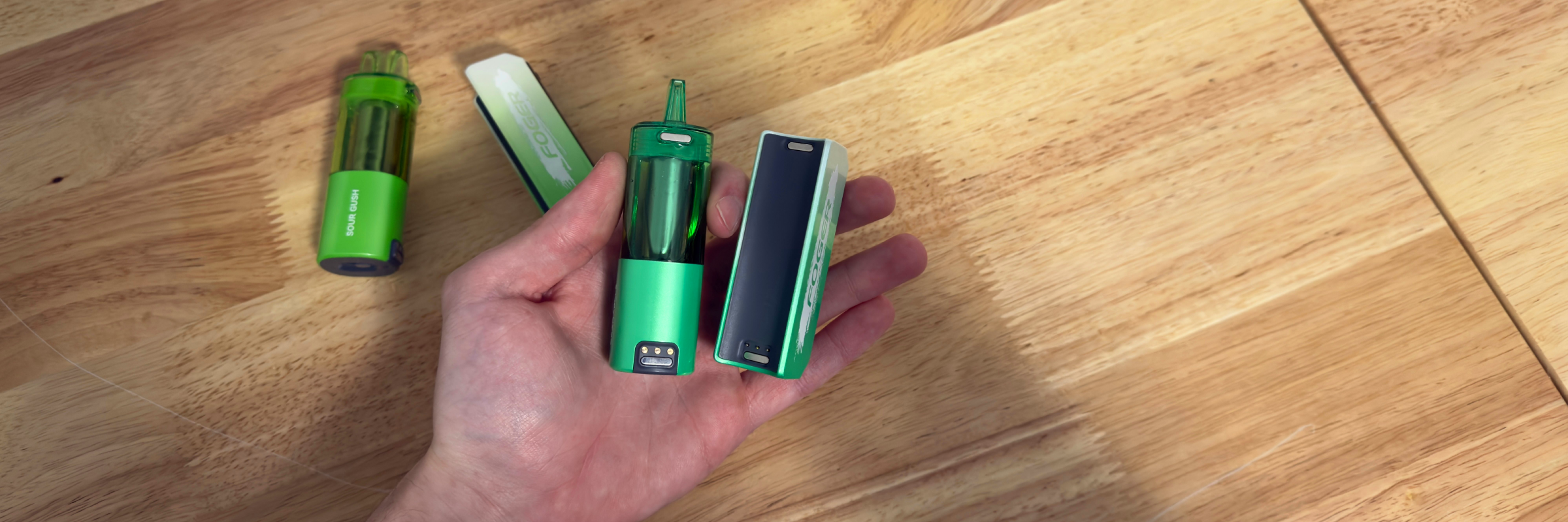 Foger Switch Pro pod and detachable magnetic battery shown separated to highlight the removable design.