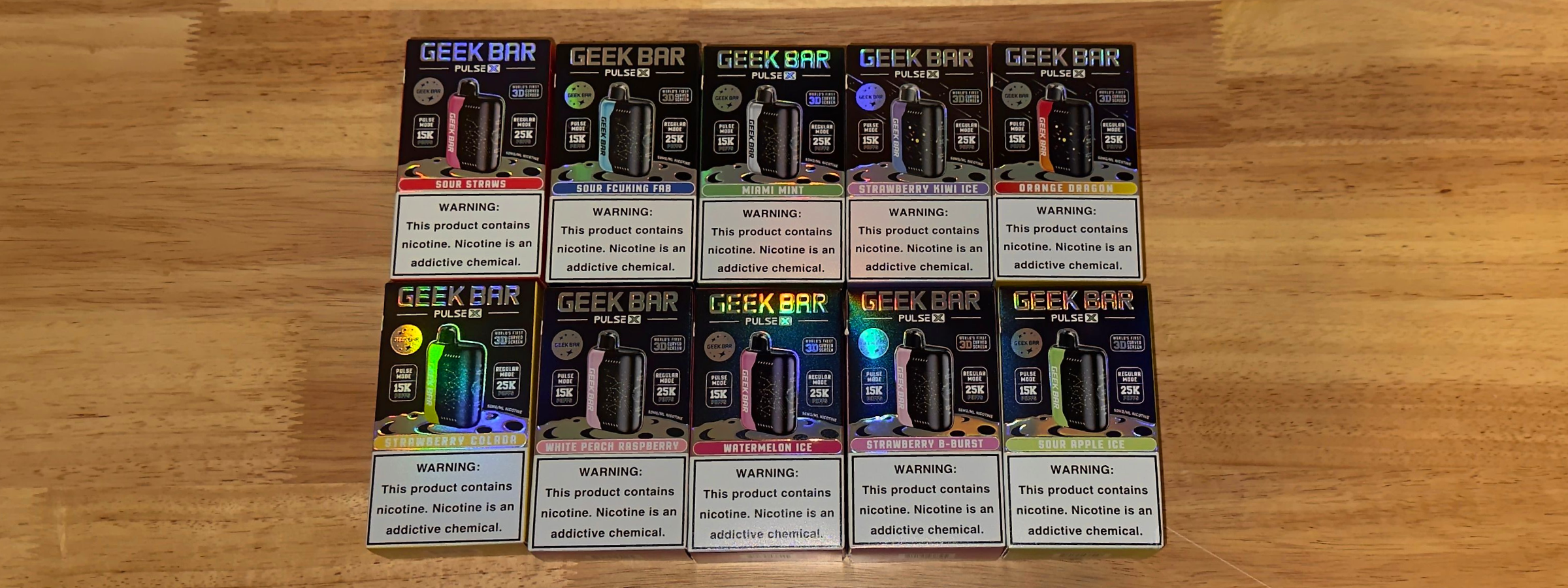 Geek Bar Pulse X 25K disposable vape flavor lineup arranged in retail packaging.